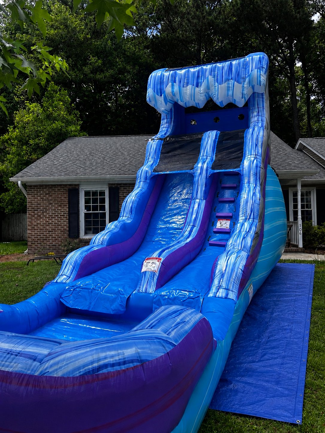 Splash Blue — Wet-only double-lane water slide with ocean-wave styling and a splash pool. Hot-day crowd-