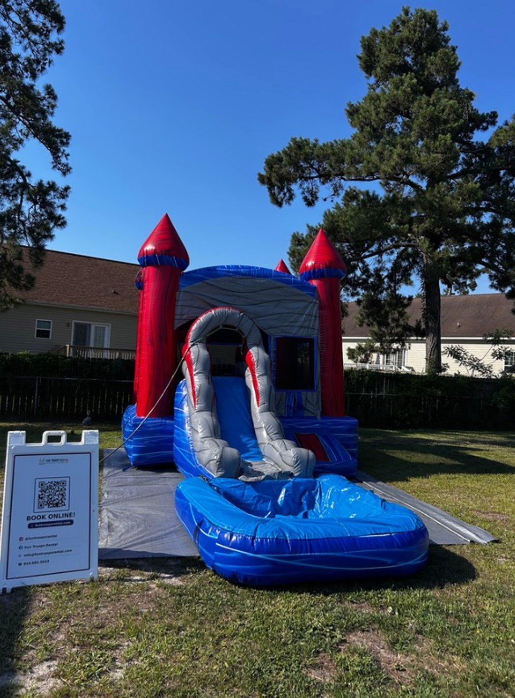 All-American Combo — Red, white & blue bounce-house combo with slide. Wet or dry setup available.