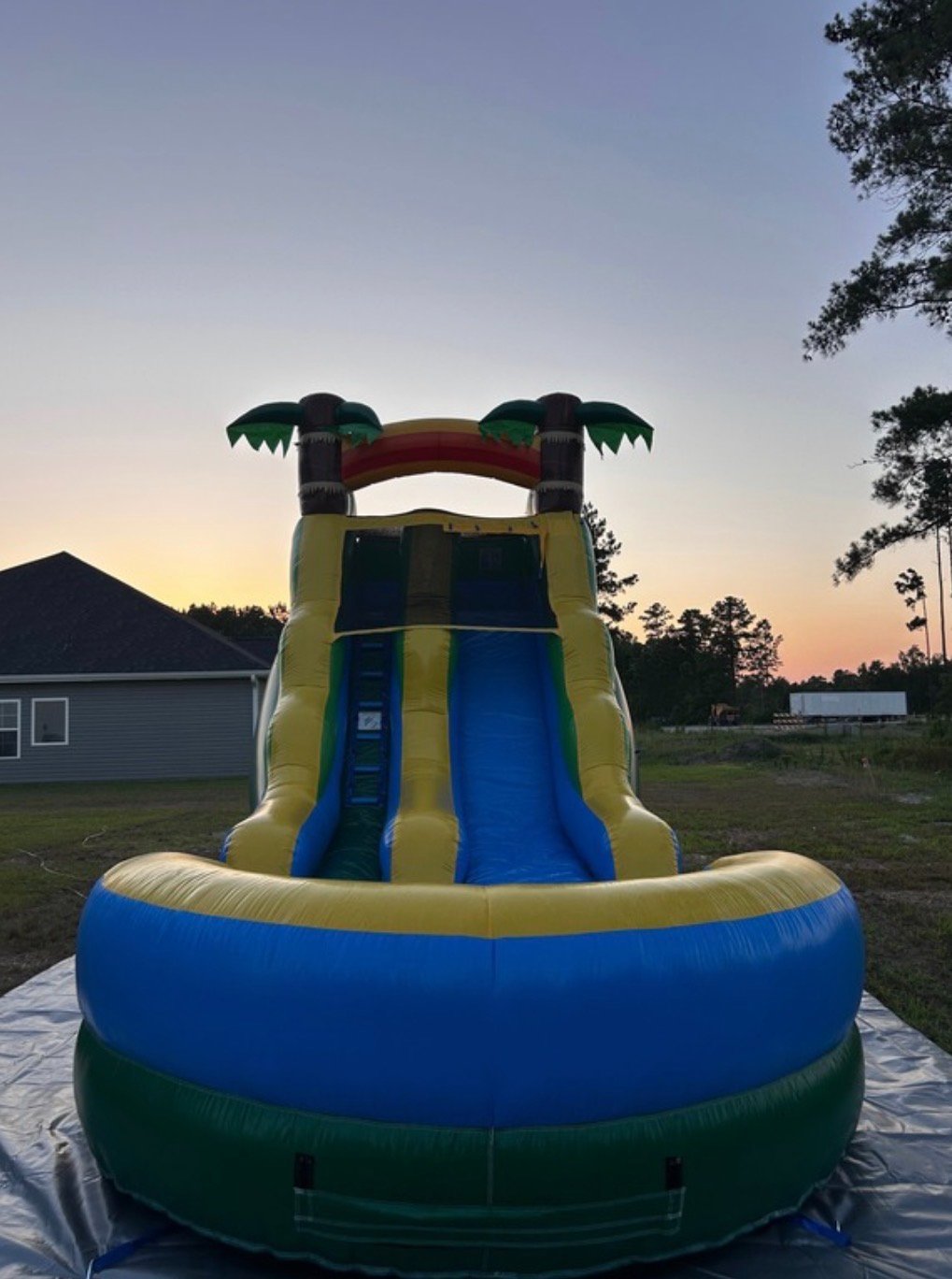 Tropical Slide — Bring the island vibes straight to your backyard with our 19ft Tropical Water Slide-a tall